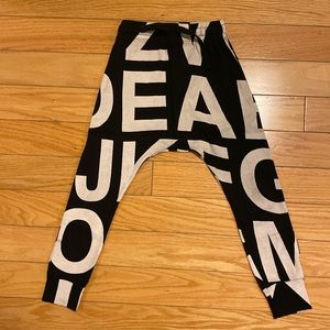 nununu alphabet light baggy pants black and cream.size 4-5 100%cotton. Like new.